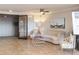 Lobby area featuring ceramic tile flooring, a couch and an open doorway at 5200 Brittany S Dr # 1807, St Petersburg, FL 33715