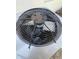 Close-up shot of an outdoor HVAC unit, highlighting the fan and protective grille at 5312 Berkley Rd, New Port Richey, FL 34652