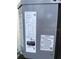 The HVAC unit shows the manufacturer's specifications and energy efficiency ratings on its exterior at 5312 Berkley Rd, New Port Richey, FL 34652