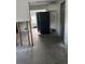 Spacious kitchen area featuring a modern refrigerator, offering a blend of functionality and design at 5312 Berkley Rd, New Port Richey, FL 34652