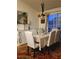 Elegant dining room with chandelier, table with six chairs, and sliding glass doors at 584 52Nd N Ave, St Petersburg, FL 33703