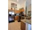 Bright kitchen featuring stainless steel appliances, granite counters, and ample cabinet space at 584 52Nd N Ave, St Petersburg, FL 33703