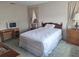 Comfortable bedroom space is enhanced by natural light and plush carpeting at 5970 80Th N St # 312, St Petersburg, FL 33709