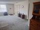 Bright living room featuring neutral carpet and views of the entryway and furnishings at 5970 80Th N St # 312, St Petersburg, FL 33709
