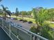 Scenic view of parking area lined with palm trees, offering convenient and ample parking spaces at 5970 80Th N St # 312, St Petersburg, FL 33709