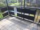 Relax on this tiled patio, that features an iron railing, for a peaceful retreat at 5970 80Th N St # 312, St Petersburg, FL 33709