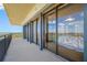 Expansive balcony with panoramic views of city and water, enclosed by sliding glass doors at 7600 Bayshore Dr # 1206, Treasure Island, FL 33706