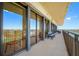 Expansive balcony offers bench seating and panoramic views of the intercostal waterway and city at 7600 Bayshore Dr # 1206, Treasure Island, FL 33706