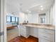 Bedroom features a granite-topped makeup vanity with storage and view access at 7600 Bayshore Dr # 1206, Treasure Island, FL 33706