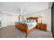 This cozy bedroom features a ceiling fan, ample closet space and neutral tones at 7600 Bayshore Dr # 1206, Treasure Island, FL 33706