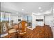 Lovely dining area with views into the kitchen and access to the balcony at 7600 Bayshore Dr # 1206, Treasure Island, FL 33706