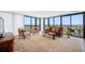 Inviting living room featuring floor to ceiling windows with scenic city views at 7600 Bayshore Dr # 1206, Treasure Island, FL 33706