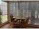 Bright breakfast nook featuring a wooden table with chairs and lots of natural light at 776 Lakewood Dr, Palm Harbor, FL 34684
