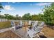 An inviting backyard with a fire pit area, perfect for gatherings and relaxation at 8335 Fountain Ave, Tampa, FL 33615