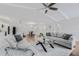 Bright living room featuring hardwood floors, neutral paint, and modern furnishings perfect for relaxation at 8335 Fountain Ave, Tampa, FL 33615