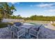 A cozy outdoor seating area with plush seating and a view of the pool at 8335 Fountain Ave, Tampa, FL 33615