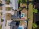 Birds eye view of a home with a backyard pool near the water at 8335 Fountain Ave, Tampa, FL 33615