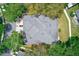 Overhead view of home highlighting the roof and surrounding greenery at 8521 Acorn Ridge Ct, Tampa, FL 33625