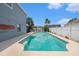 Enjoy the refreshing backyard pool, ideal for hot summer days, complemented by serene landscaping at 8704 Tarrington Pl, Tampa, FL 33635