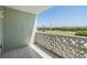 Private balcony with decorative screen offers natural light and an exterior view at 9 Forbes Pl # 205, Dunedin, FL 34698