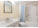 Bathroom featuring a standard shower and a classic vanity at 9 Forbes Pl # 205, Dunedin, FL 34698