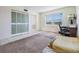 Bedroom featuring a window and a built-in closet at 9 Forbes Pl # 205, Dunedin, FL 34698