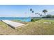 Bocce ball and horseshoe courts by the water, with palm trees add to this condo's outdoor recreation at 9 Forbes Pl # 205, Dunedin, FL 34698