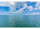 Expansive water view with blue skies and tranquil turquoise water at 9 Forbes Pl # 205, Dunedin, FL 34698