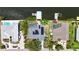 Aerial view showing waterfront homes with private docks and swimming pools, showcasing community living at 907 Golf Island Dr, Apollo Beach, FL 33572