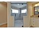 Beautifully renovated shower with glass door and decorative tile at 907 Golf Island Dr, Apollo Beach, FL 33572
