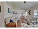 Cozy living room with a couch, striped armchairs, and hardwood floors at 907 Golf Island Dr, Apollo Beach, FL 33572
