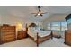 Beautifully decorated main bedroom features a ceiling fan, and coordinated furnishings at 907 Golf Island Dr, Apollo Beach, FL 33572