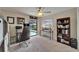 Office with a pool view, ceiling fan, and lots of natural light at 907 Golf Island Dr, Apollo Beach, FL 33572