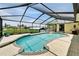Beautiful screened-in pool area with a waterfront view, perfect for enjoying serene outdoor living at 907 Golf Island Dr, Apollo Beach, FL 33572