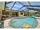 Inviting screened-in pool with patio area, ideal for enjoying sunny days and outdoor gatherings at 907 Golf Island Dr, Apollo Beach, FL 33572