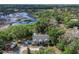 Serene aerial view showcases home with waterfront access and lush greenery at 9520 Indale Dr, New Port Richey, FL 34654