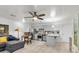 Bright living room with stainless steel appliances and access to the kitchen area at 9520 Indale Dr, New Port Richey, FL 34654