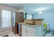 Kitchen with stainless steel appliances and granite countertops at 9814 Ashburn Lake Dr, Tampa, FL 33610