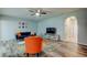 Inviting living room with stylish decor, including a colorful rug and modern furniture at 9814 Ashburn Lake Dr, Tampa, FL 33610