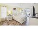 Inviting main bedroom with a spacious layout, neutral tones, and direct access to the outdoor patio area at 10021 Elgin Blvd, Spring Hill, FL 34608