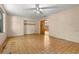Simple bedroom featuring a ceiling fan and closet space at 1205 E Emma St, Tampa, FL 33603