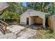 Detached garage in the backyard, has large open doors for easy access and storage at 1205 E Emma St, Tampa, FL 33603