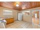 Kitchen featuring ample counter space, tiled flooring, and essential appliances at 1205 E Emma St, Tampa, FL 33603