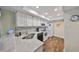 Updated kitchen with granite counters, stainless sink, and plenty of cabinet space at 1211 Golfview Woods Dr, Sun City Center, FL 33573