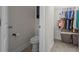 Walk-in closet includes racks for hanging and closet organizer with storage at 14493 Promenade Pkwy, Odessa, FL 33556
