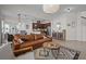 Expansive living room seamlessly flows into the dining and kitchen areas, featuring stylish decor at 14493 Promenade Pkwy, Odessa, FL 33556