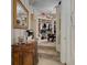 Spacious walk-in closet with custom shelving and adjacent coffee bar at 15053 Peace Blvd, Spring Hill, FL 34610