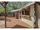 Spacious outdoor deck with a bar and ample space for entertaining and enjoying the tropical views at 15053 Peace Blvd, Spring Hill, FL 34610