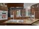 Spacious kitchen with granite countertops, modern appliances, and custom cabinetry at 15053 Peace Blvd, Spring Hill, FL 34610