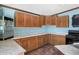 Functional kitchen with ample counter space, wooden cabinetry, and a convenient layout for cooking at 15053 Peace Blvd, Spring Hill, FL 34610